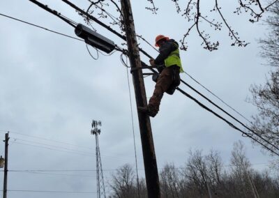 Local 71 Member Climbing A Pole